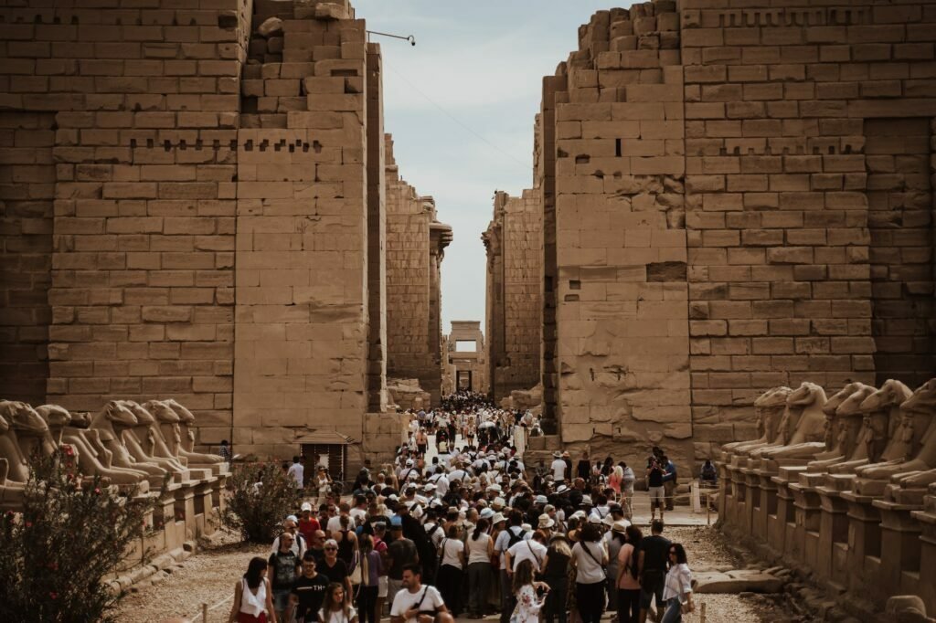 tourists visiting the karnak temple in egypt